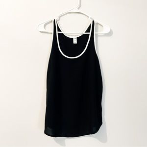 Black tank top with white piping detail